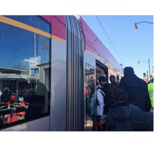 The moment so many waited for: boarding the Streetcar for the first time. Photo by María Helena Carey