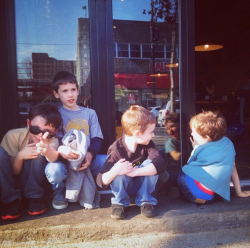 Hanging out with friends at the flagship &pizza. You can see in the reflection how different H Street looks. Photo by María Helena Carey, via Instagram.