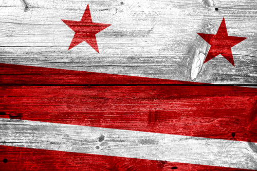 Washington DC Flag painted on old wood plank texture