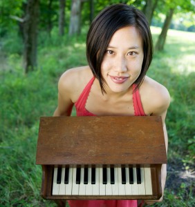 Phyllis Chen and her toy piano