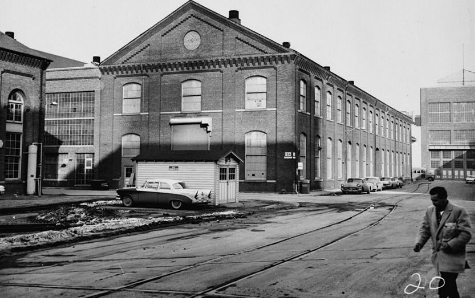 Building 104 at the Navy Yard, at the corner of Tingey St and Isaac Hull Ave. The train tracks can be seen in this 1950 picture. (LOC)